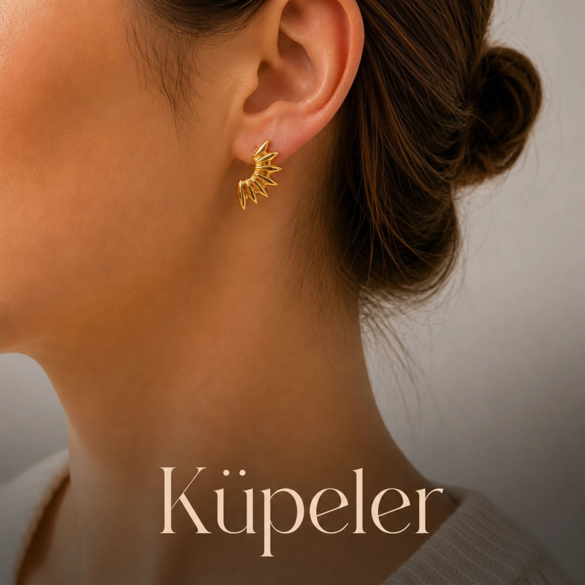 Küpeler